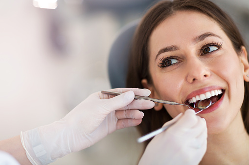 Female patient of Cooley Smiles smiling about her dental exam in Everett, WA
