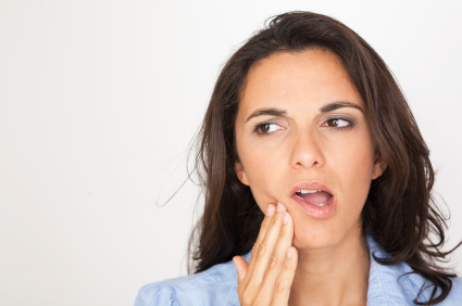Woman in need of gum disease treatment by her dentist in Owasso, OK at Jillian Prather Family Dentistry.