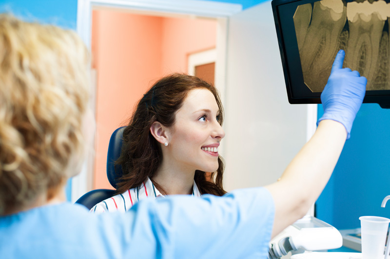 Digital X-rays by dentist at Neu Family Dental.