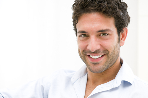 Man smiling about his cosmetic dental bonding byy his Owasso, OK dentist at Jillian Prather Family Dentistry. Man smiling about his cosmetic dental bonding byy his Owasso, OK dentist at Jillian Prather Family Dentistry.